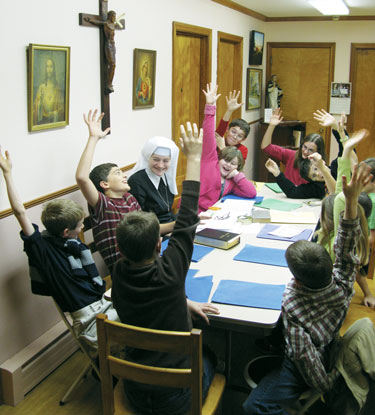 Sr. Louise Marie teaching children